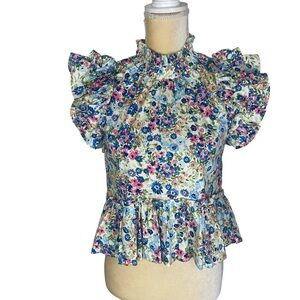 Meet Me in Santorini Irene Peplum Blouse with Ruffled Cap Sleeves